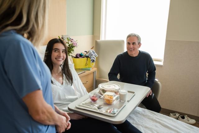 Patient being served food