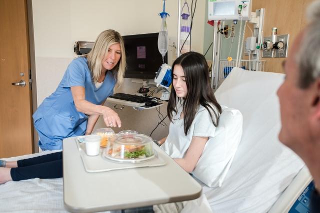 Patient being served food